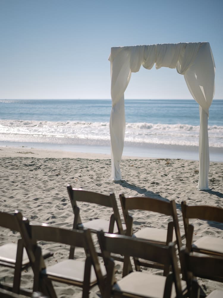 White drapery arches on Torrance Beach