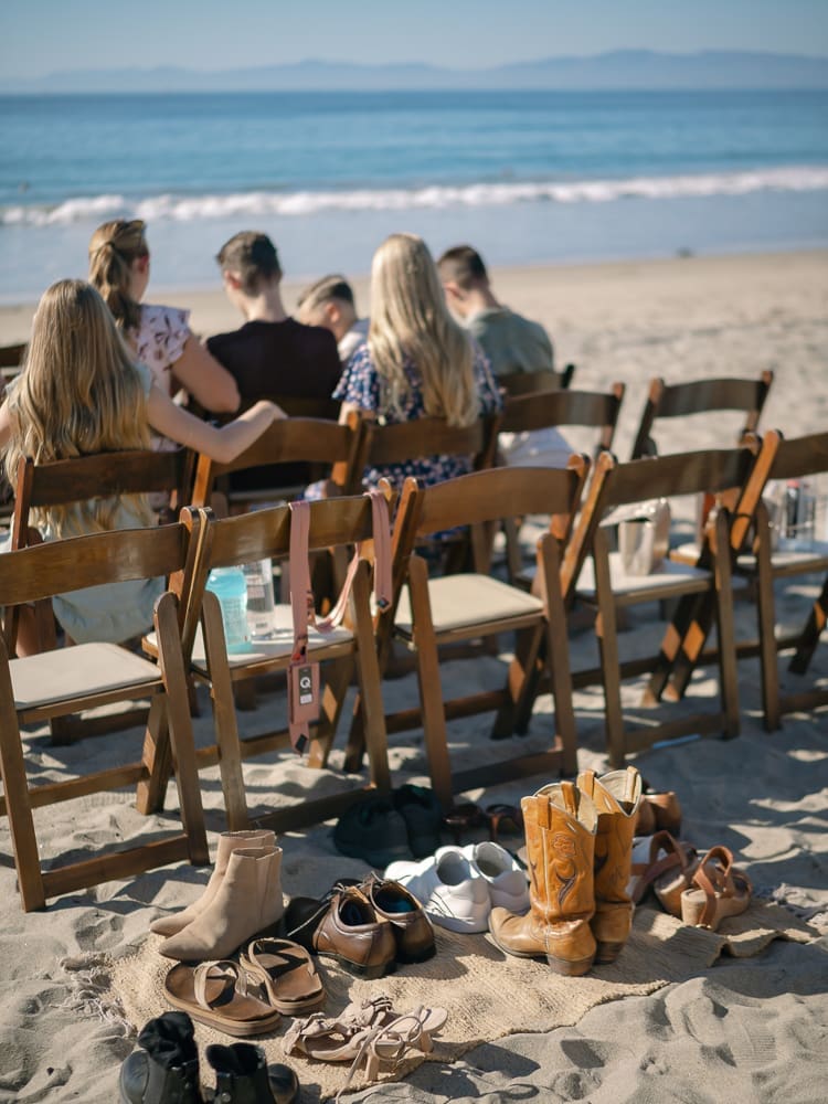Shoes off beach wedding ceremony on Torrance Beach
