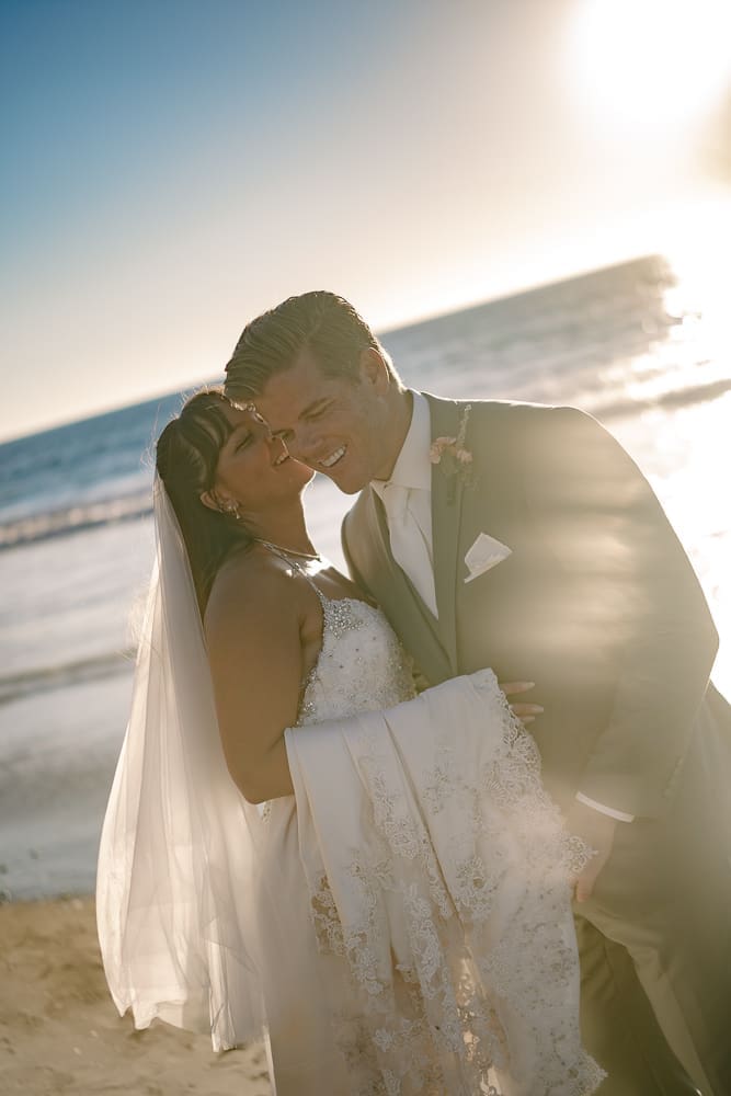 Bride and groom during golden hour on Torrance Beach